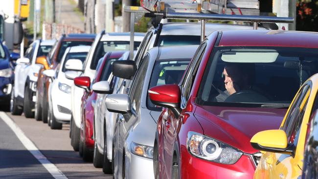 Police have urged drivers to remain patient around Covid testing sites with queues stretching kilometres. Picture: NCA NewsWire/Peter Lorimer.