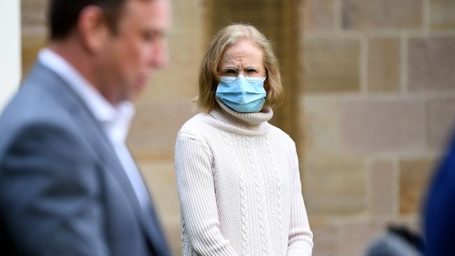 Queensland chief health officer Dr Jeannette Young watches Deputy Premier Steven Miles during a media conference to provide a Covid update, at Parliament House in Brisbane. Picture: NCA NewsWire / Dan Peled