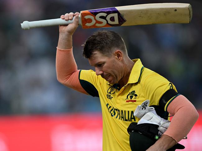 Australia's David Warner reacts as he walks back to the pavilion after his dismissal during the 2023 ICC Men's Cricket World Cup one-day international (ODI) match between Australia and Netherlands at the Arun Jaitley Stadium in New Delhi on October 25, 2023. (Photo by Arun SANKAR / AFP) / -- IMAGE RESTRICTED TO EDITORIAL USE - STRICTLY NO COMMERCIAL USE --