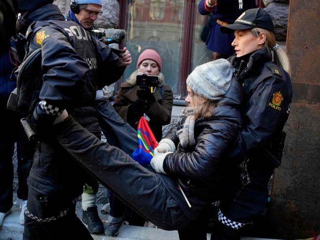 Police arrested Greta Thunberg outside Norway’s Ministry of Finance. Picture: AFP