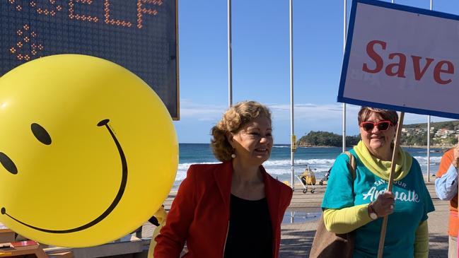 Councillors Candy Bingham (left) and Penny Philpott (right) protesting in support of the arts community. Picture: Madelaine Wong