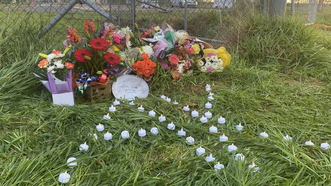 Floral tributes left at the scene of a fatal car crash at Edinburgh RAAF base. Picture: Todd Lewis