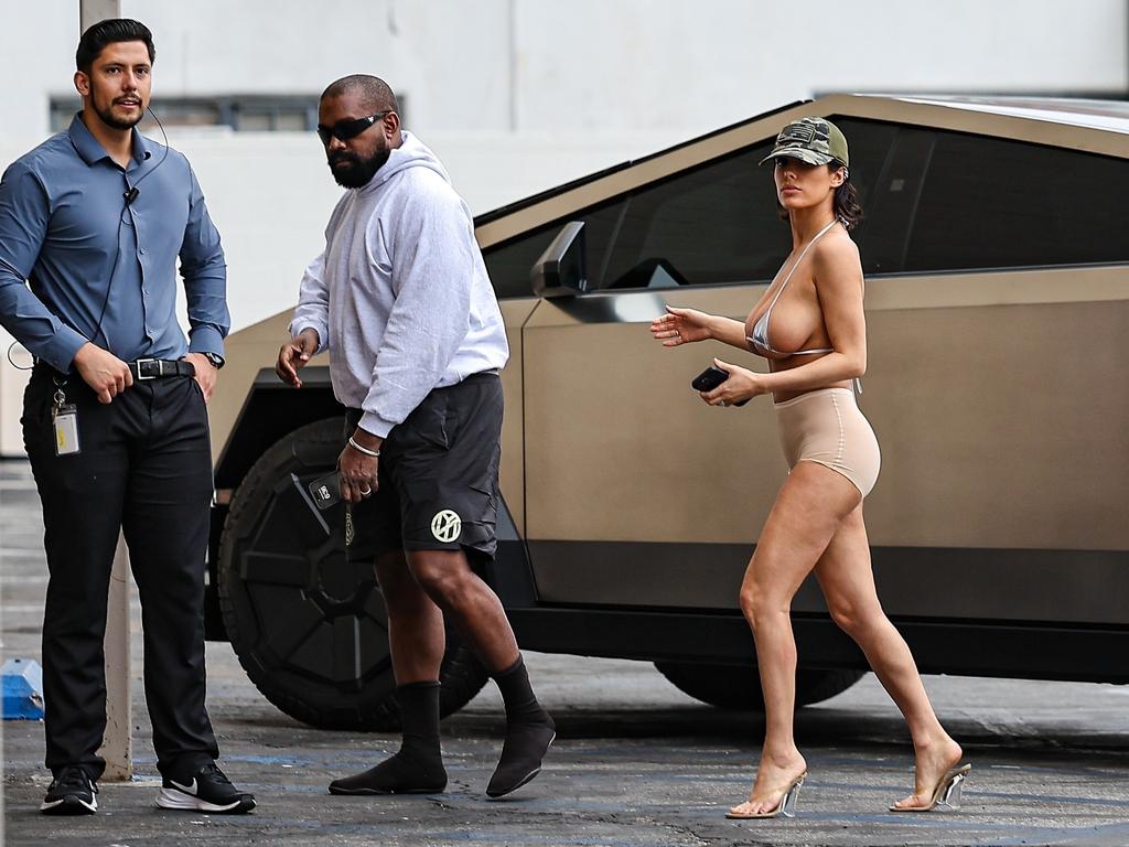 Rapper Kanye West and wife Bianca Censori step out for lunch at Bludso's BBQ in LA on July 13, arriving in a Tesla Cybertruck. Picture: SPOT-LESE / BACKGRID