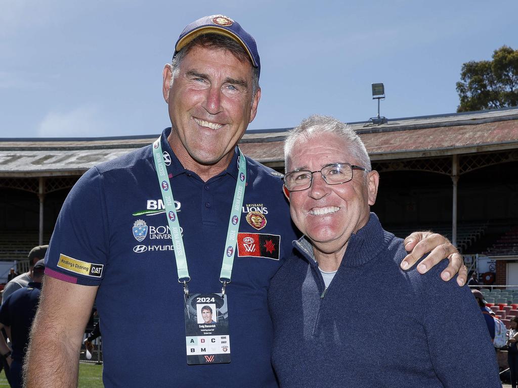 Brisbane AFLW coach Craig Starcevich (left) with AFL coach Chris Fagan. The two men have steered the club to five consecutive grand finals across the two competitions. Picture: Michael Klein