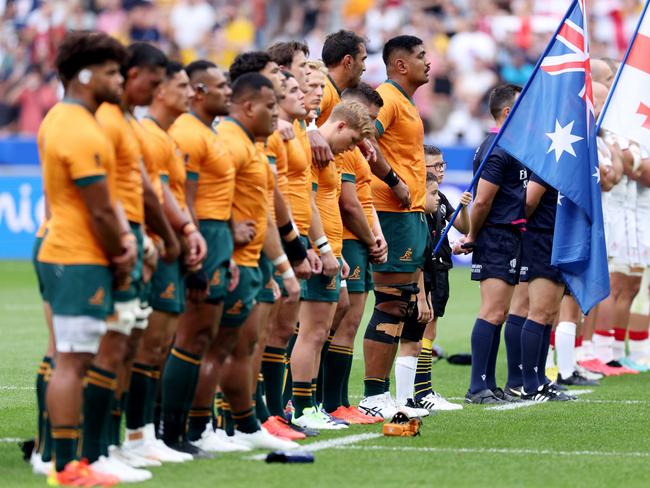 PARIS, FRANCE - SEPTEMBER 09: The players of Australia line up prior to the Rugby World Cup France 2023 match between Australia and Georgia at Stade de France on September 09, 2023 in Paris, France. (Photo by Warren Little/Getty Images)