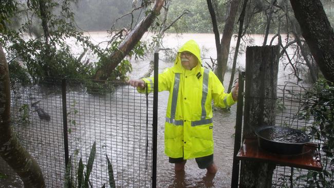 Ron Bonner at his flooded property on Farrell Drive Currumbin. Picture: Glenn Hampson