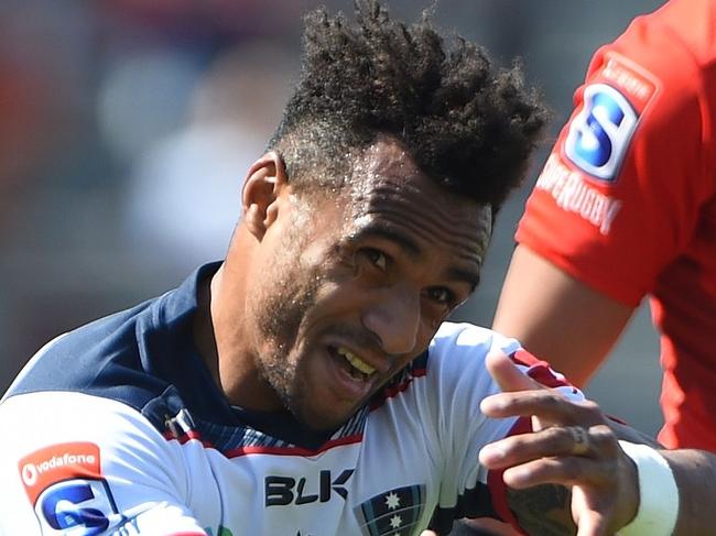 Rebels' Will Genia passes the ball during the Super Rugby match between Japan's Sunwolves and Australia's Melbourne Rebels at Chichibunomiya stadium in Tokyo on May 25, 2019. (Photo by CHARLY TRIBALLEAU / AFP)