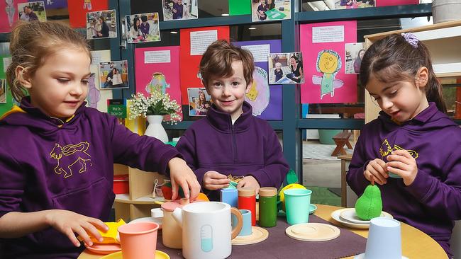 Wesley College early learning centre students Lucy, Tommy and Sofia. Picture: Ian Currie