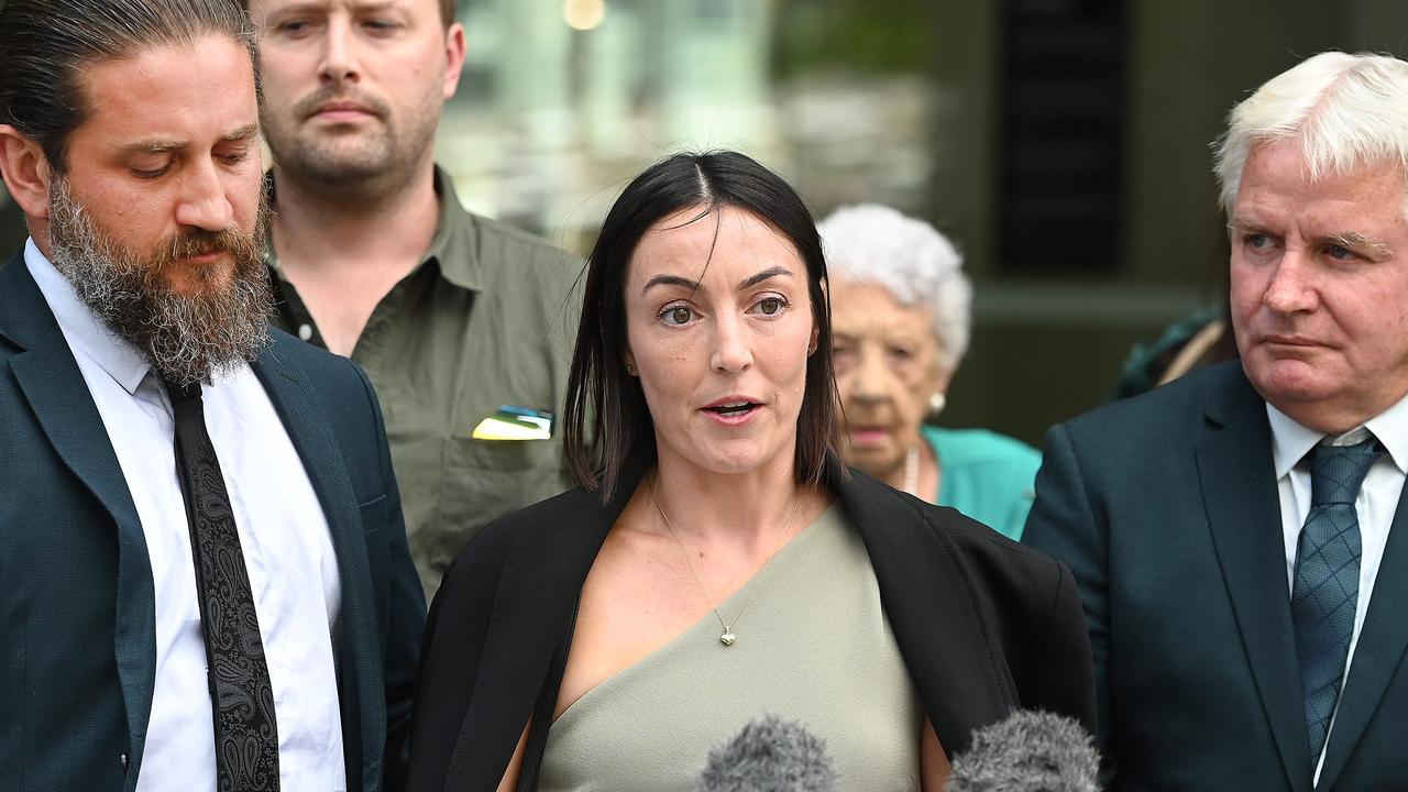 Danielle Carroll with her husband Reece (left) and Kelly’s father Reg (right) outside court in Brisbane. Picture: NCA NewsWIRE / John Gass