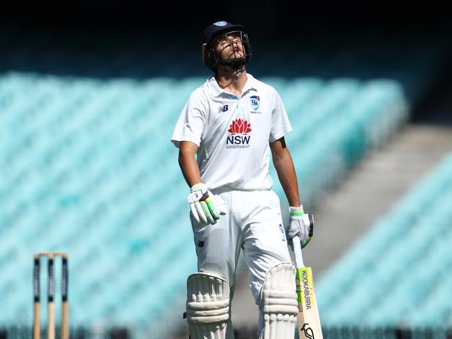 SYDNEY, AUSTRALIA - FEBRUARY 19: Sam Konstas of the Blues walks off the field after been dismissed by Scott Boland of Victoria during the Sheffield Shield match between New South Wales Blues and Victoria at Sydney Cricket Ground on February 19, 2025 in Sydney, Australia. (Photo by Jason McCawley/Getty Images)