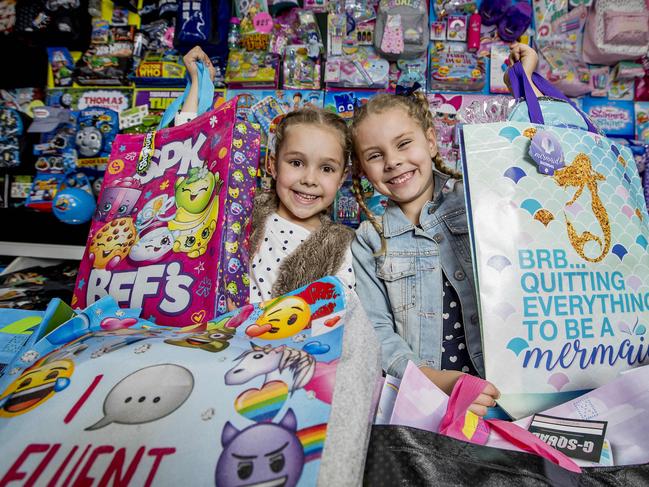 Mia Gardner, 6, and Billie Frampton, 6, do some window shopping in the Showbag Pavilion ahead of this year's Gold Coast Show at Broadwater Parklands. Picture: Jerad Williams