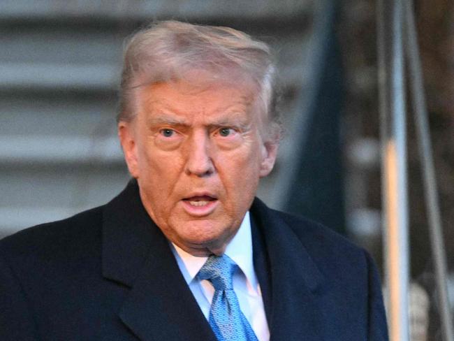 US President Donald Trump walks to speak to reporters before boarding Marine One as he departs from the South Lawn of the White House in Washington, DC on January 31, 2025 en route to his Mar-a-Lago resort in Palm Beach, Florida. (Photo by Mandel NGAN / AFP)