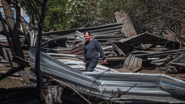 A local resident walks among the remains of an industrial building damaged after a Russian missile strike in Odesa on Thursday.Picture: Oleksandr Gimanov/AFP