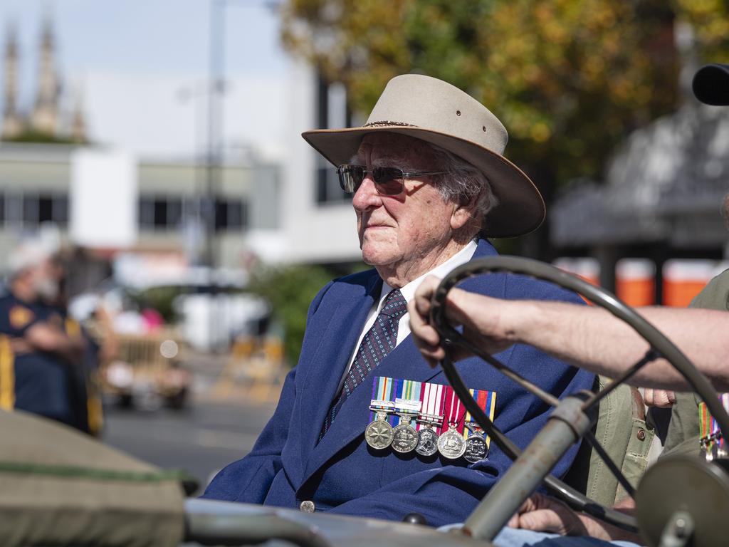 Ralph Caldwell is driven on Margaret St in Toowoomba's Anzac Day mid-morning march to the Mothers' Memorial, Thursday, April 25, 2024. Picture: Kevin Farmer