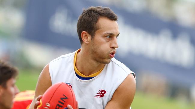 New recruit Tom Doedee at training in front of Lions fans at Brighton Home Arena on Sunday. Picture Lachie Millard