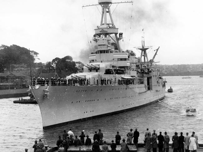 Heavy cruiser USS Chicago about to berth in Sydney Harbour during WWII in 1940.