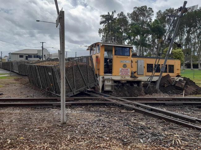 Emergency services responded after a cane train derailed in Ingham on July 24. Picture: Cameron Bates