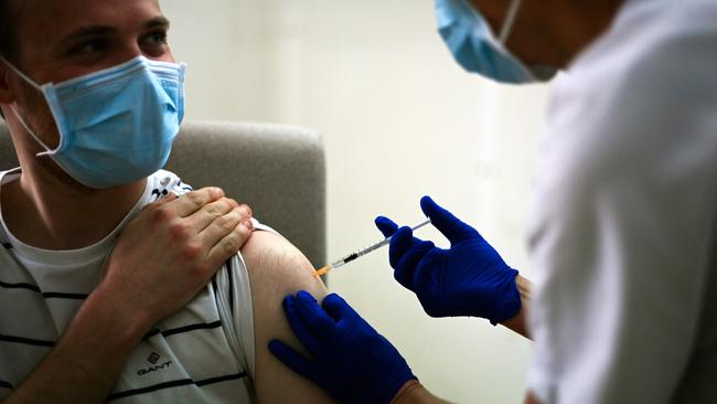 A health worker is injected with a dose of a COVID-19 vaccine at the Edouard Herriot hospital in Lyon, France. Picture: AFP