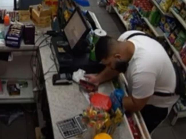 A man can be heard delivering demands to a worker at a tobacconist in Melbourne’s north.