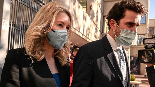 Former Theranos founder and CEO Elizabeth Holmes (L) leaves the Robert F. Peckham Federal Building with her partner Billy Evans. Picture: Amy Osborne / AFP