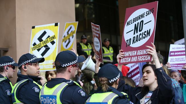 Anti-racism protesters clash with far-right wing supporters in front of the Melbourne Magistrates Court. Picture: David Crosling