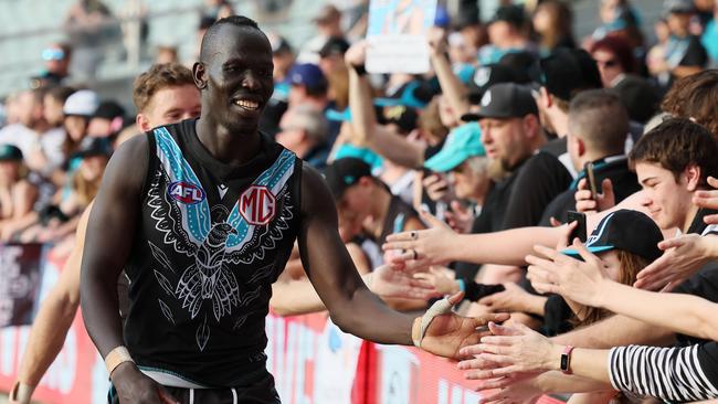 ADELAIDE, AUSTRALIA - JUNE 03: Aliir Aliir of the Power after their win during the 2023 AFL Round 12 match between the Port Adelaide Power and the Hawthorn Hawks at Adelaide Oval on June 3, 2023 in Adelaide, Australia. (Photo by James Elsby/AFL Photos via Getty Images)