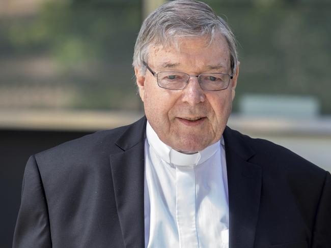 In this Dec 10, 2018, photo, Cardinal George Pell, the most senior Catholic cleric to face sex charges, departs an Australian court. Pell was sentenced in an Australian court on Wednesday, March 13, 2019 to 6 years in prison for molesting two choirboys in a Melbourne cathedral more than 20 years ago.  (AP Photo/Asanka Brendon Ratnayake)