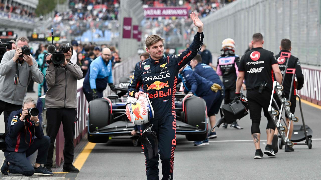 Red Bull Racing's Dutch driver Max Verstappen reacts after taking pole position at the Albert Park Circuit in Melbourne. (Photo by WILLIAM WEST / AFP)
