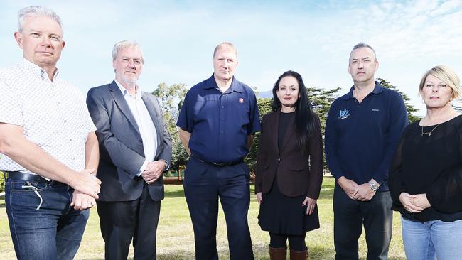 Hobart City Mission’s John Stubley, Anglicare’s Daryl Lamb, The Salvation Army’s Stuart Foster, Catholic Care’s Andrea Witt, Colony 47’s Danny Sutton, and TasCOSS’s Kim Goodes come together to tackle the housing crisis. PICTURE : MATT THOMPSON