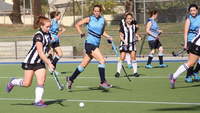 Port Adelaide Metro One women's player Nicola Higgins in action against Flinders University last year. Flinders will return to Hockey SA’s second tier competition with St Peter’s Old Collegians after winning a legal battle over their relegation. Picture: Port Adelaide Hockey Club