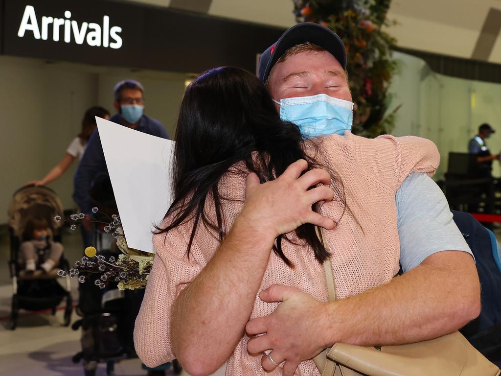 There have been many emotional reunions at Perth Airport as WA’s hard border came down. Picture: Paul Kane/Getty Images