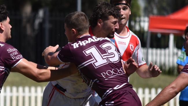 Nicholas Tsougranis crashes into the Manly defence in the SG Ball Cup, 2023. Picture: Sean Teuma/NewsLocal.