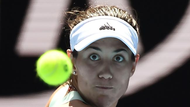 Semi-finals focus: Spain's Garbine Muguruza hits a return on her way to victory over Russia's Anastasia Pavlyuchenkova to secure a semi-finals berth. Picture: Manan Vatsyayana/AFP