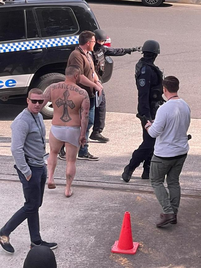 A scantily clad Mancuso immediately after he was rescued by police.