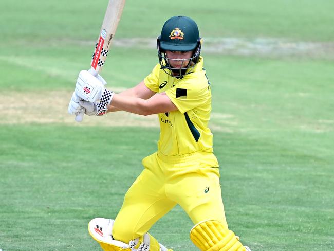 BRISBANE, AUSTRALIA - JANUARY 18: Phoebe Litchfield of Australia plays a shot during game two of the Womens One Day International series between Australia and Pakistan at Allan Border Field on January 18, 2023 in Brisbane, Australia. (Photo by Bradley Kanaris/Getty Images)