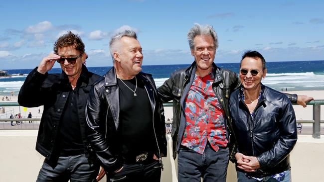 Cold Chisel members Ian Moss, Jimmy Barnes, Don Walker and Phil Small announce their tour on Bondi Beach today. Picture: Nikki Short