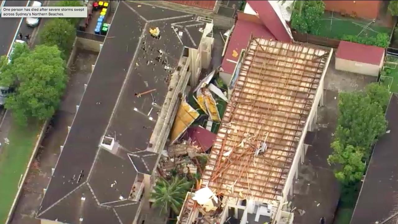 Emergency services crews are at multiple sites across the area from Dee Why to Forestville where trees, roofs and power poles have been ripped out. Picture: ABC