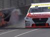 Race driver lucky to walk away as barrier falls on car