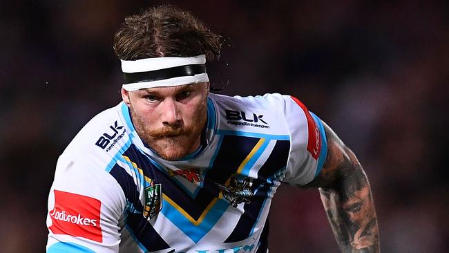 TOWNSVILLE, AUSTRALIA — SEPTEMBER 03: Chris McQueen of the Titans runs the ball during the round 26 NRL match between the North Queensland Cowboys and the Gold Coast Titans at 1300SMILES Stadium on September 3, 2016 in Townsville, Australia. (Photo by Ian Hitchcock/Getty Images)