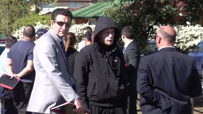 Detectives speak with Gregory Ambler (centre) after Mr Muon’s murder. Picture: Jason Webster/TNV