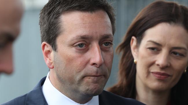 Victorian opposition Leader Matthew Guy with his wife Renae Guy at Cranbourne railway station in Melbourne, Friday, November 23, 2018. Victoria goes to the polls on Saturday for the state election. (AAP Image/David Crosling) NO ARCHIVING