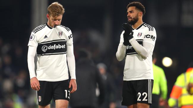 Fulham’s Cyrus Christie (right) says his sister was hit and racially abused. Picture: Getty