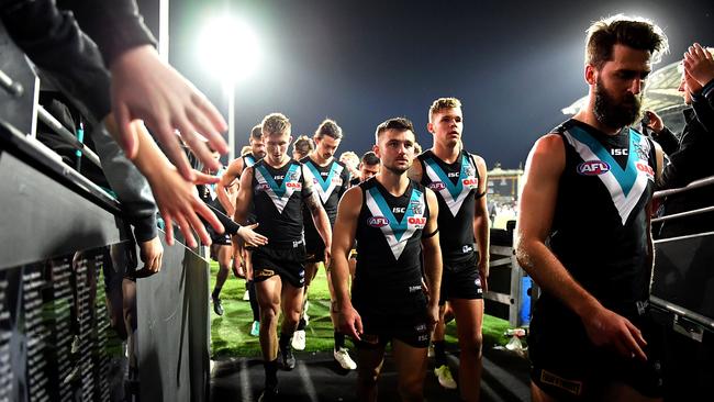 Sam Gray and Justin Westhoff walk from the field dejected after the loss. Picture: Getty Images