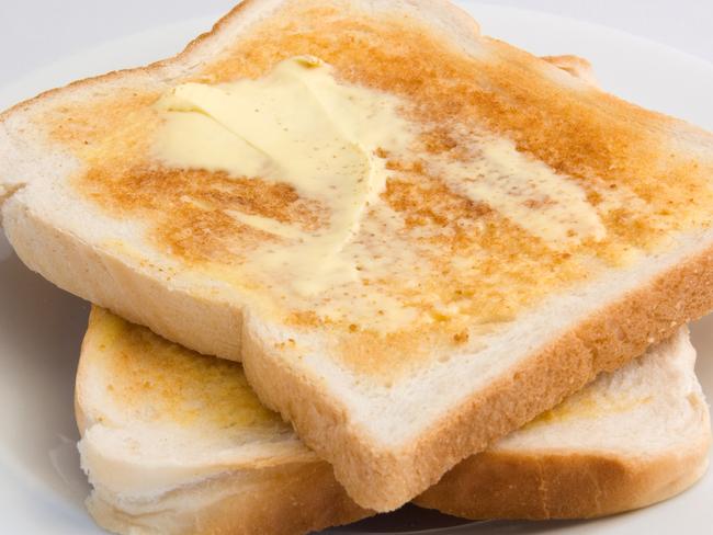 A piece of white toast with butter is a common breakfast staple. Picture: iStock