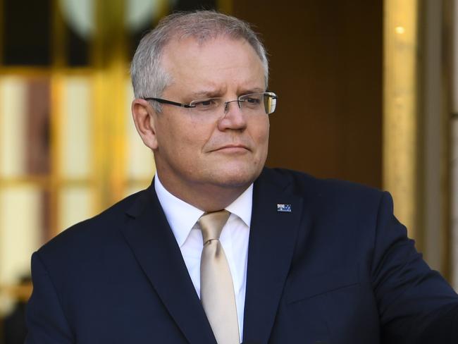 Australian Prime Minister Scott Morrison (right) and Australian Treasurer Josh Frydenberg speak to the media during a press conference at Parliament House in Canberra, Thursday, March 12, 2020. (AAP Image/Lukas Coch) NO ARCHIVING