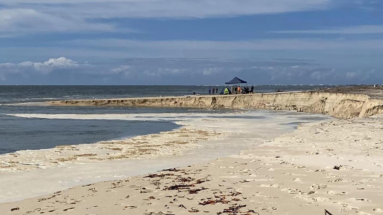 Visitors to Inskip Point caught a sinkhole opening up on Inskip Point on Anzac Day 2024 while the area was flooded with hundreds of campers.