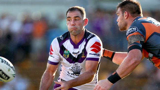 Storm's Cameron Smith gets a pass away during the round 4 NRL game between the Wests Tigers and the Melbourne Storm at Leichhardt Oval, Leichhardt. Picture: Gregg Porteous