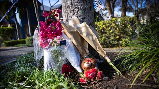 Tributes left at the Emerald Lakes street where young Sophie Wang lost her life. Picture: Nigel Hallett.