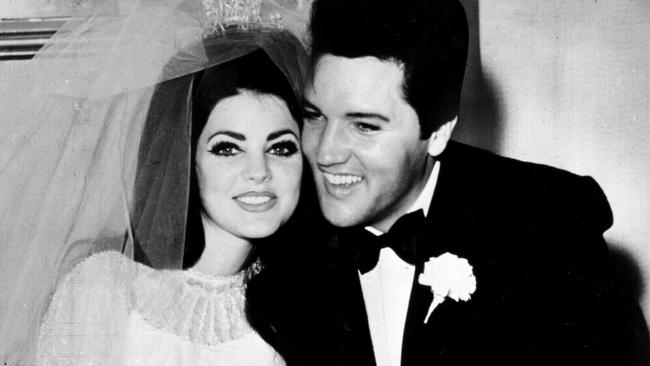 Elvis Presley with Priscilla on their wedding day, 1967.