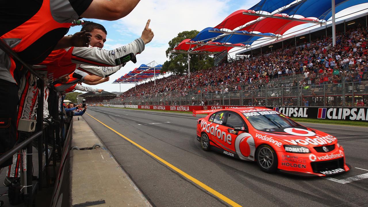 Jamie Whincup crosses the line to win race one at the Adelaide 500 in 2012.